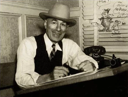 George Herriman at his drawing board